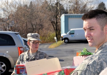733rd Soldiers join community to fill Stockings for Soldiers