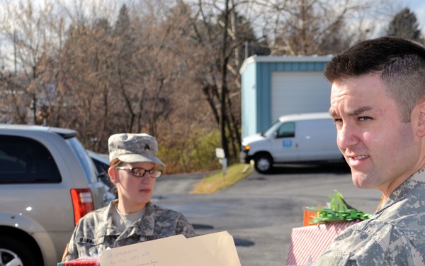 733rd Soldiers join community to fill Stockings for Soldiers