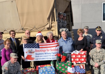 733rd Soldiers join community to fill Stockings for Soldiers