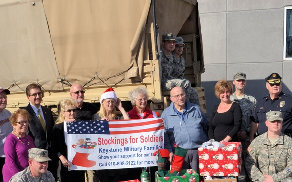 733rd Soldiers join community to fill Stockings for Soldiers