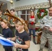 Airmen, school children serenade residents