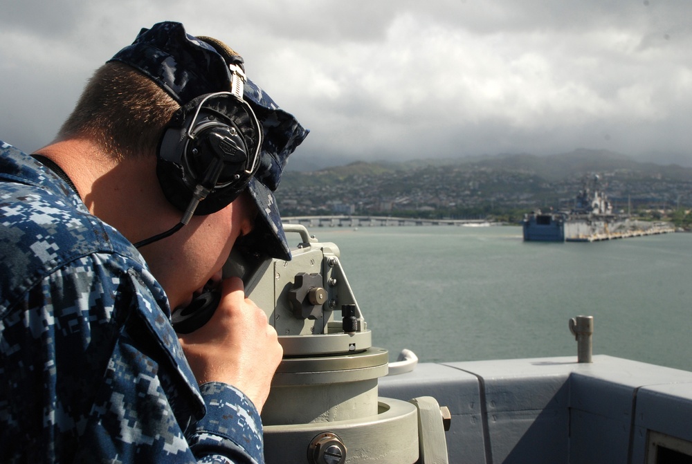 USS Green Bay sailor checks bearings