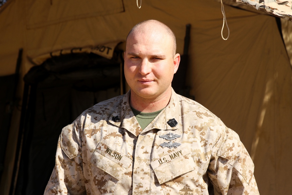 Corpsman uses environment for medical treatment