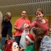 Airmen help Santa deliver gifts to special needs school