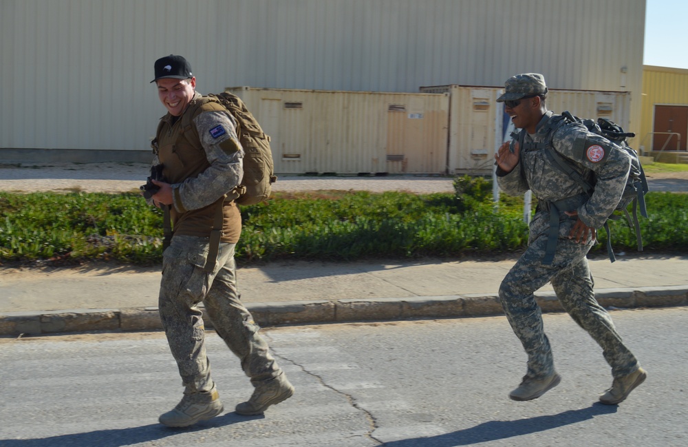 Deployed Soldiers conquer grueling road march