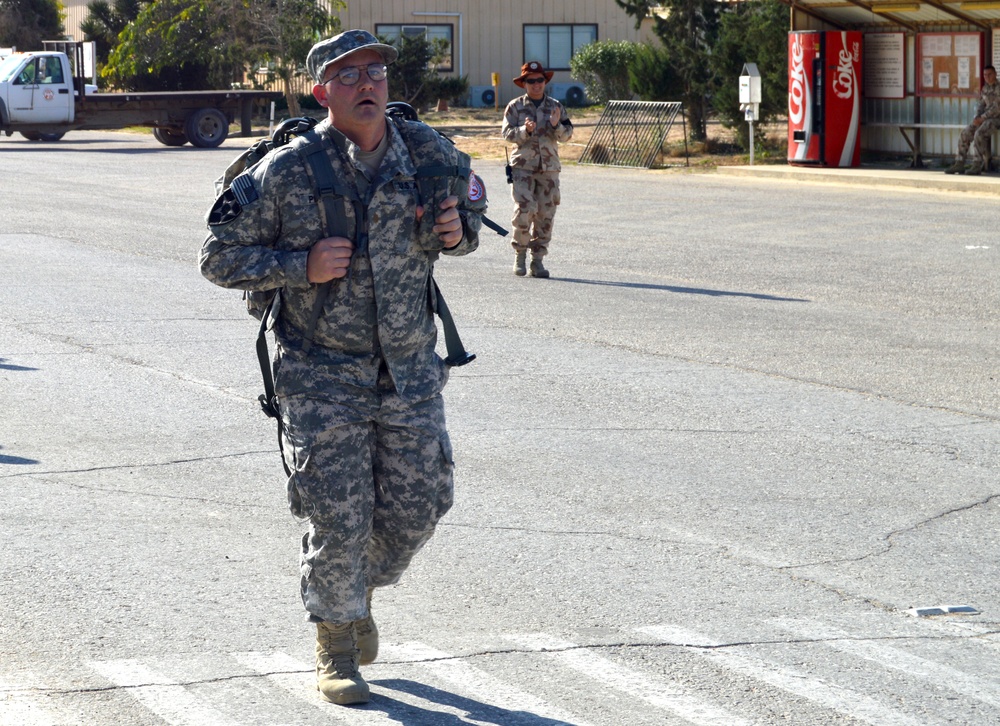 Deployed Soldiers conquer grueling road march