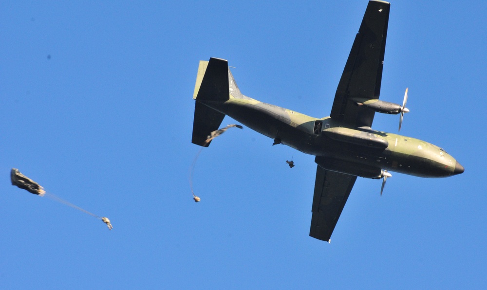 US Army paratroopers descend from aircraft