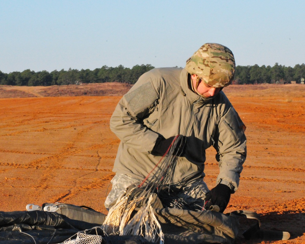 US Army Soldier recovers parachute