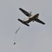 US Army paratrooper descends from CASA-212 aircraft