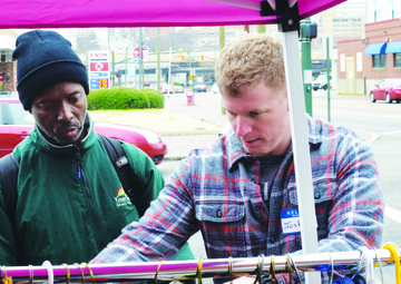 Student officers volunteer at Richmond clothing giveaway