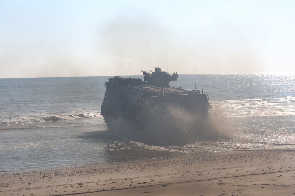 Integrated Task Force AAVs splash on Onslow Beach