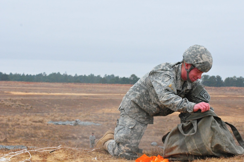 US Army Soldier recovers parachute