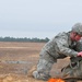 US Army Soldier recovers parachute