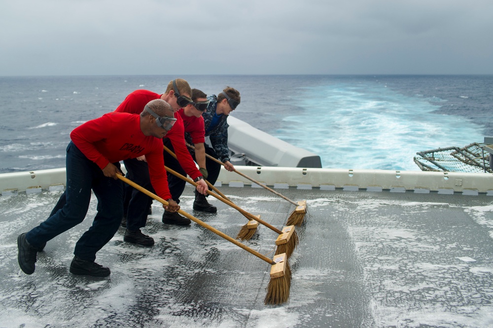 USS Peleliu conducts flight deck wash down