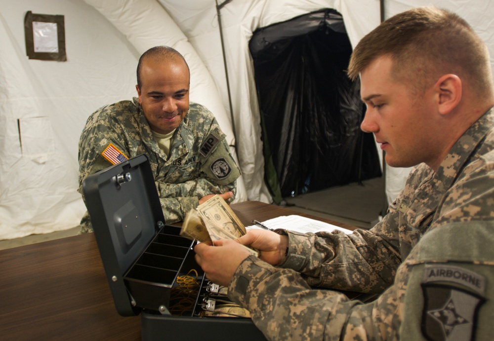 Finance Soldiers bring cash to troops, boost morale