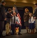 Family pins 2nd lieutenant at ROTC commissioning ceremony