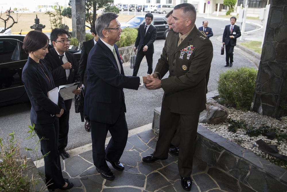 Okinawa Governor Takeshi Onaga, Lt. Gen. John Wissler exchange greetings
