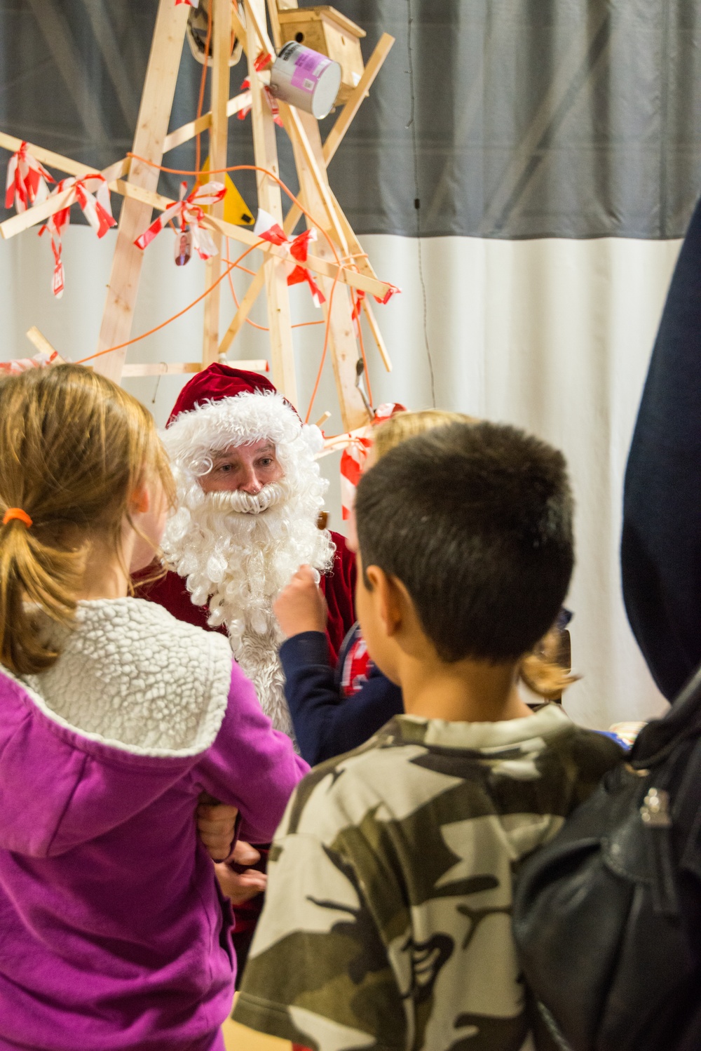 Santa Claus visits kids from a local home in Chievres