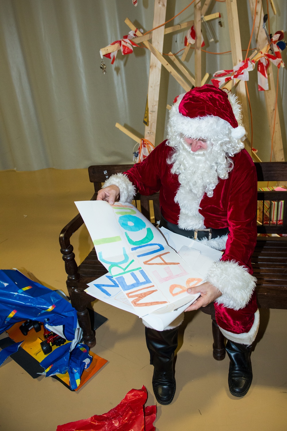 Santa Claus visits kids from a local home in Chievres