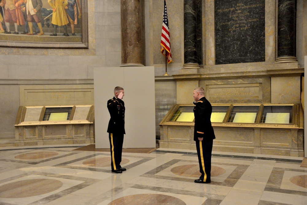 Army Reserve Soldier renders first salute to newly commisioned officer