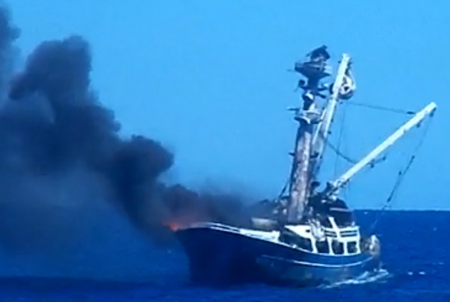 Crew members saved from burning ship