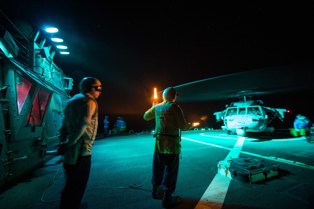 USS Mitscher conducts night delayed landing qualifications