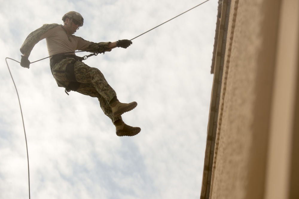 Commander, Task Group 56.1 EOD Technicians rappelling