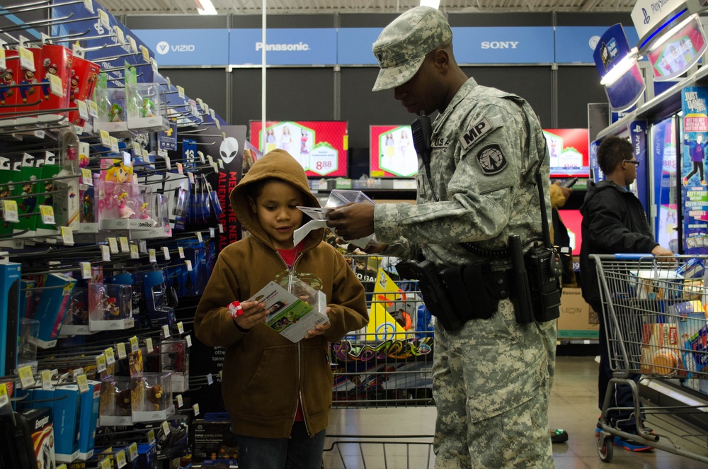 Fort Campbell police participate in annual Shop with a Cop Event in Hopkinsville, Kentucky