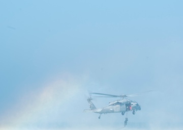 Commander, Task Group 56.1 Explosive Ordnance Disposal technicians conduct Helicopter Cast and Recovery