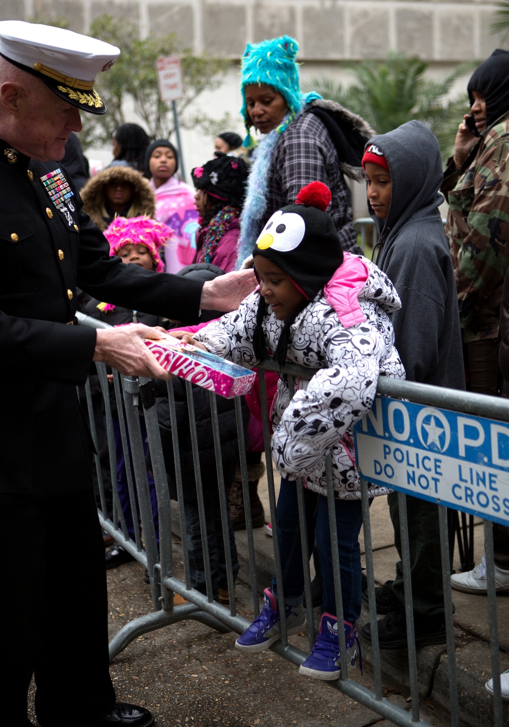 Marines work with ZULU Social Aid and Pleasure Club for the 2014 Toys for Tots Campaign