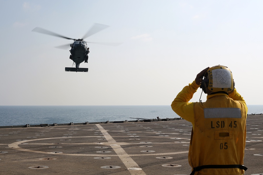 Two MH-60s land aboard USS Comstock