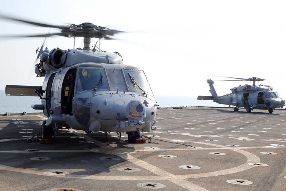 Two MH-60s land aboard USS Comstock