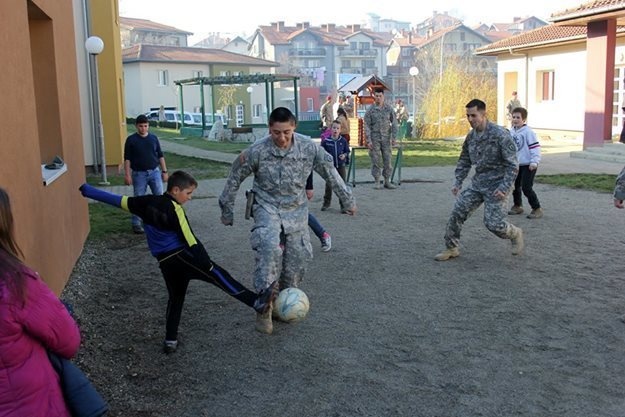 Soldiers celebrate Christmas at a Kosovo orphanage