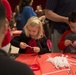 Santa brings food, fun to families on Camp Foster
