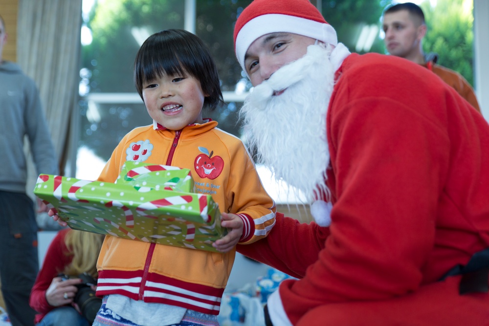 Marine Thrift Store donates toys to children’s home