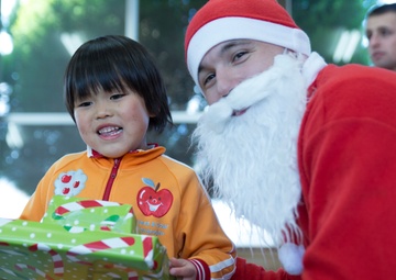 Marine Thrift Store donates toys to children’s home