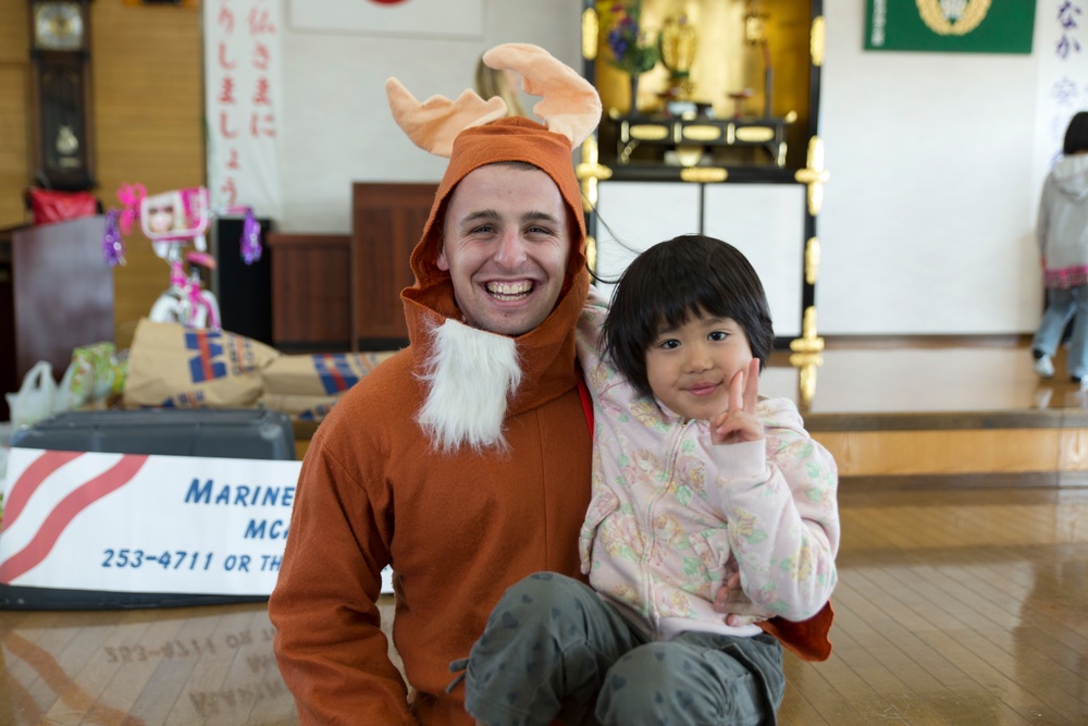 Marine Thrift Store donates toys to children’s home