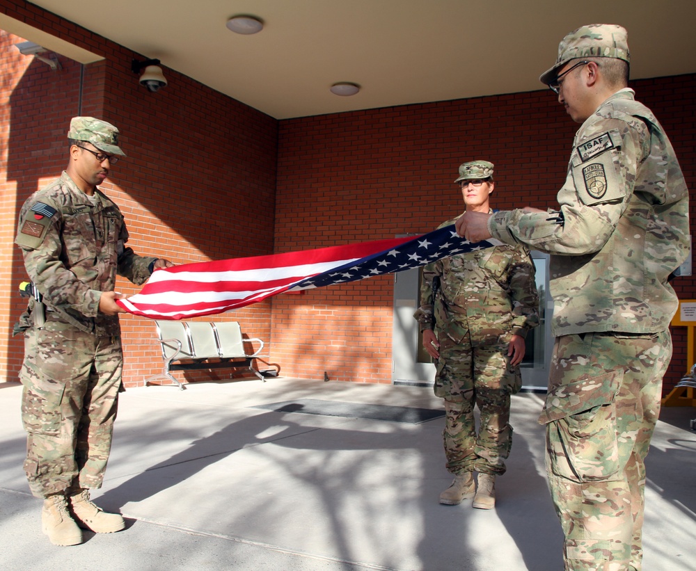 Sailors retiring the colors