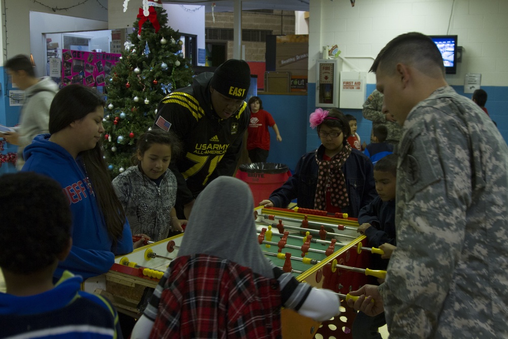 Soldiers and athletes play together