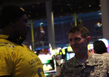 Soldier Mentor and player interact at All-American Bowl