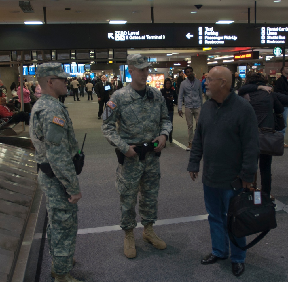 Nevada MPs talk with a civilian during Operation Vigilant Sentinel