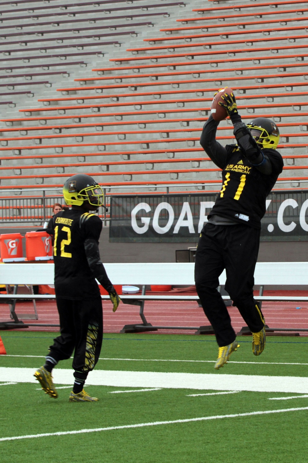 East team practice at the Alamo Stadium
