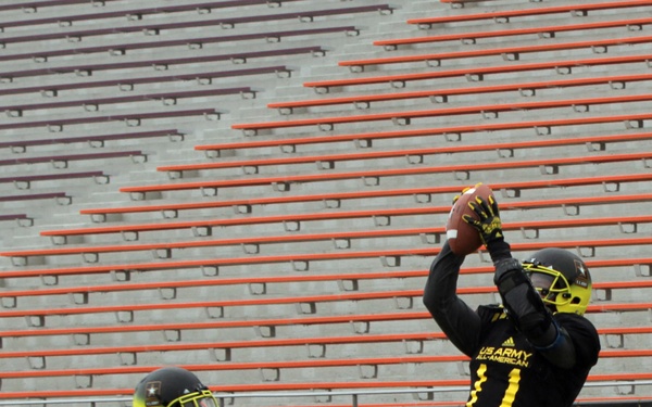 East team practice at the Alamo Stadium