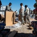 US Air Force and US Army bundle 121 tons of aid for Iraqis