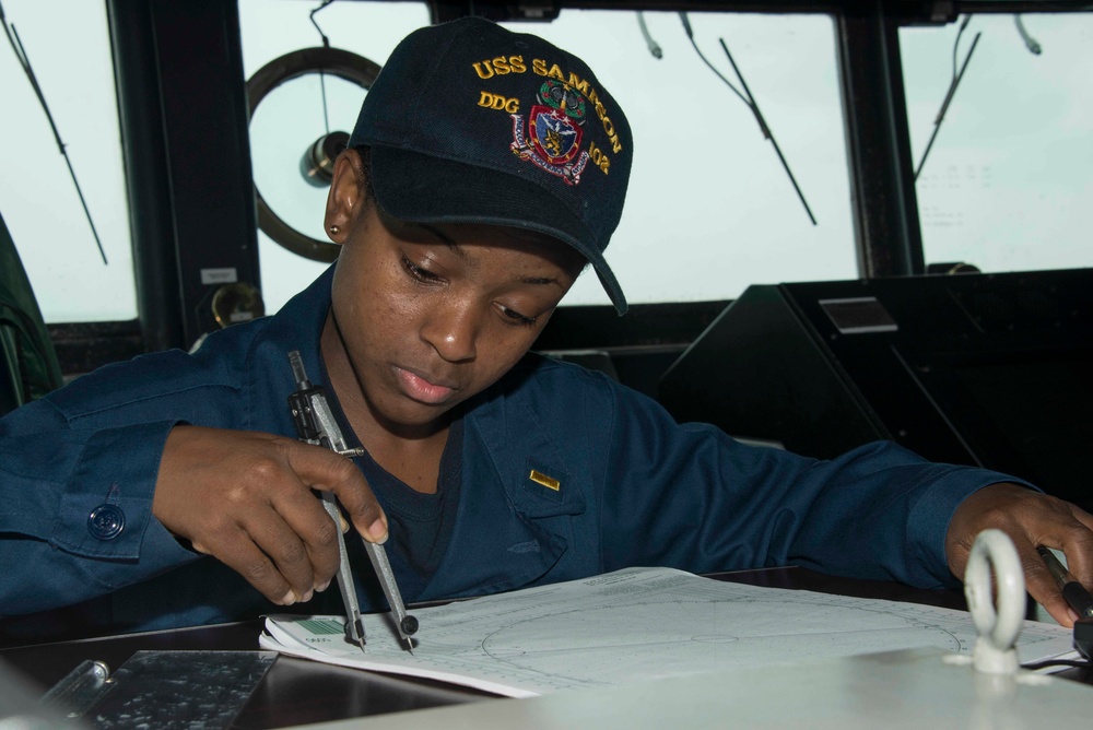 Recovery team from USS Sampson (DDG 102) conducts search and recovery operations for AirAsia flight QZ8501 search efforts
