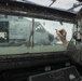 Recovery team from USS Sampson (DDG 102) conducts search and recovery operations for AirAsia flight QZ8501 search efforts