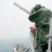 Recovery team from USS Sampson (DDG 102) conducts search and recovery operations for AirAsia flight QZ8501 search efforts