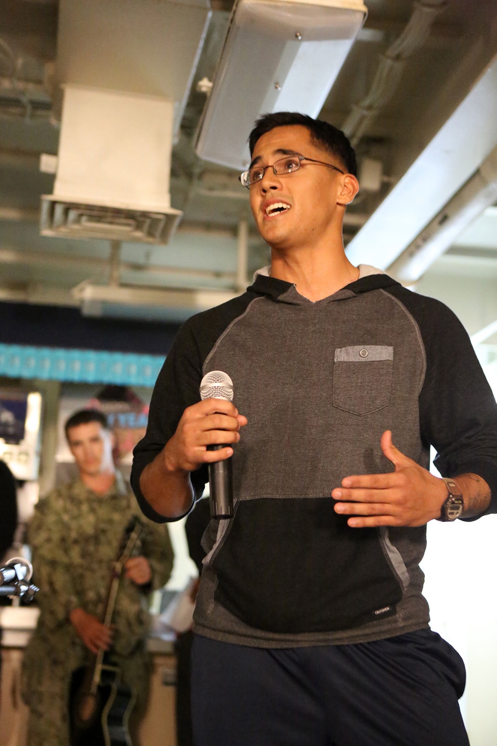 USS Comstock rings in the New Year with an open mic night