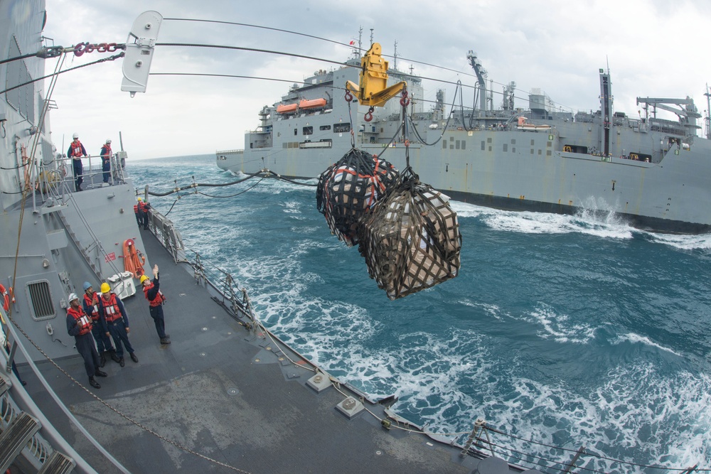 USS Sampson (DDG 102) conducts a replenishment at sea