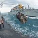 USS Sampson (DDG 102) conducts a replenishment at sea